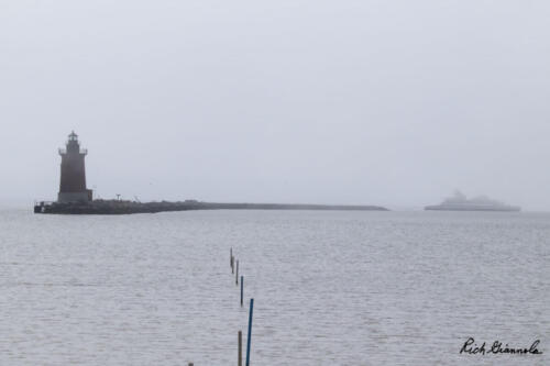 Foggy morning with the Cape May-Lewes Ferry about to pass the Delaware Breakwater East End Lighthouse